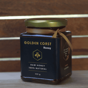 Front view of golden coast honey jar